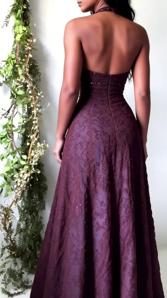 Woman wearing purple lace halter evening gown - elegant formal dress detail