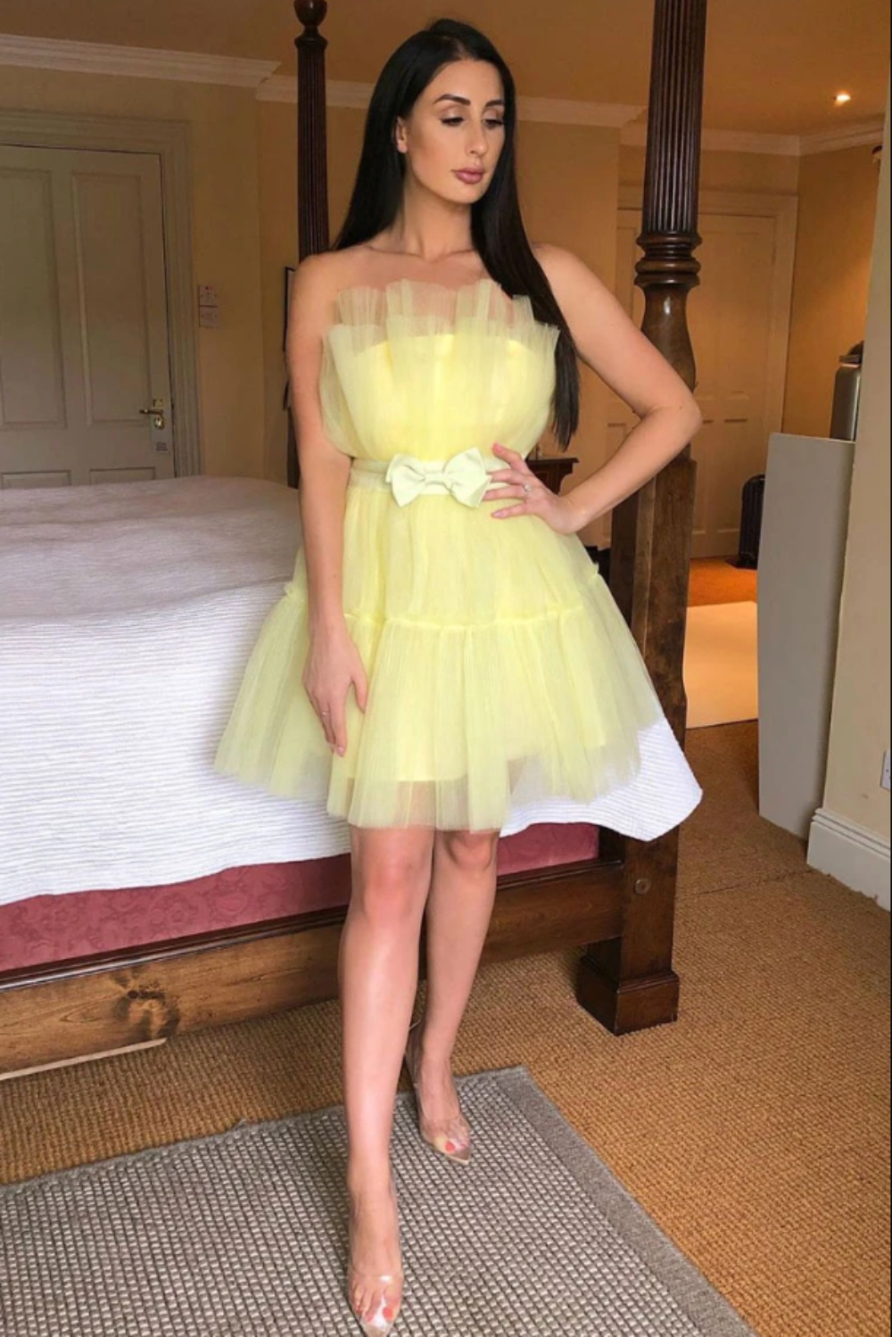 Yellow tulle short homecoming dress with flirty silhouette and playful design
