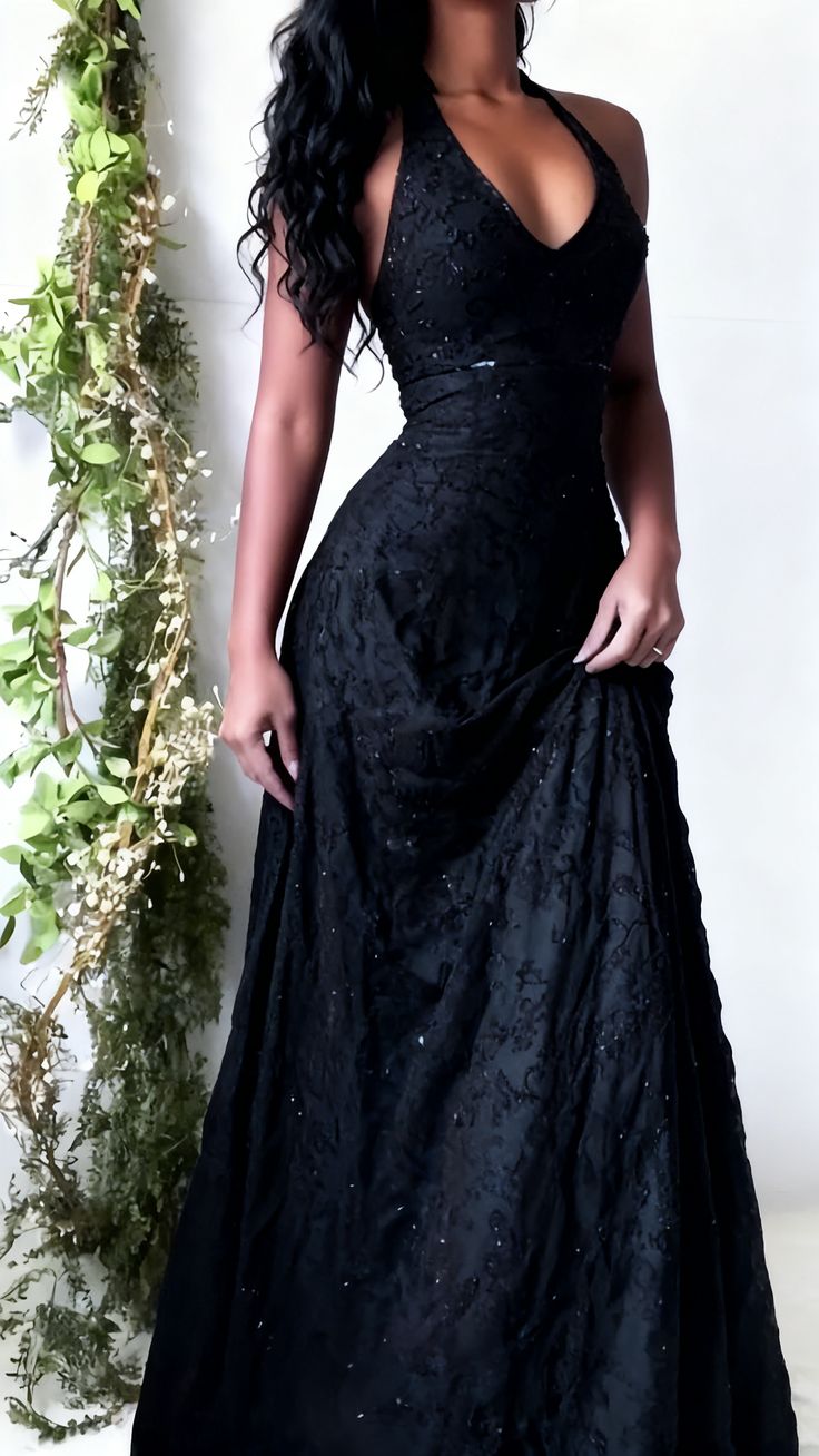 Black halter prom dress detail shot - V-neckline and lace pattern