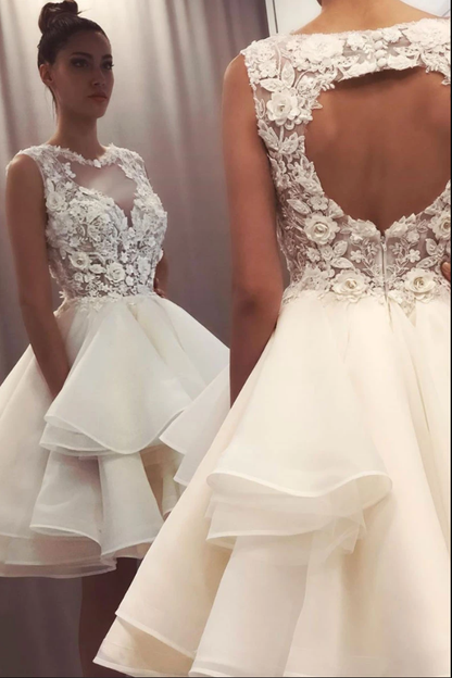 White lace cocktail dress back view showing delicate tulle and lace overlay